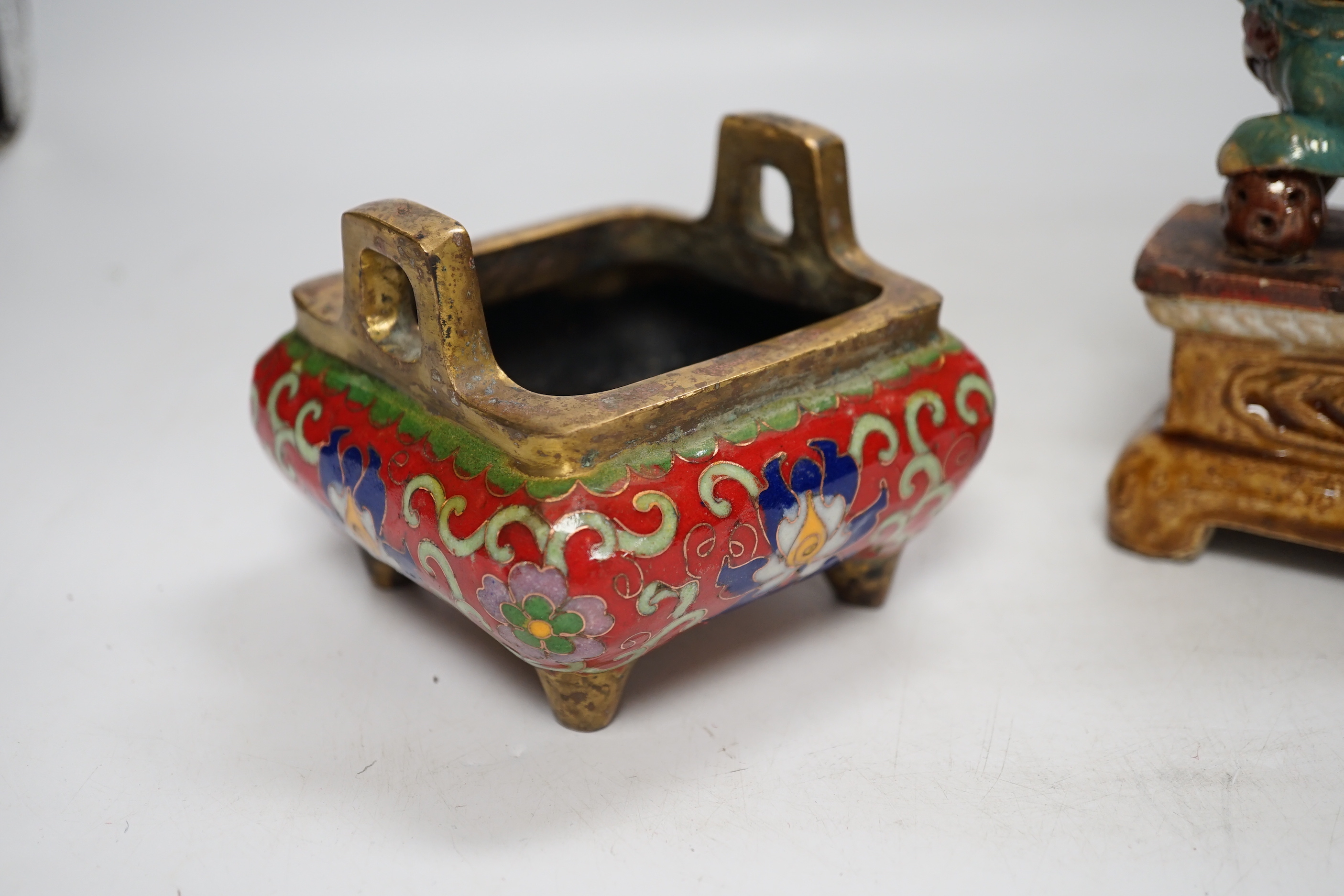 A 19th century Chinese Shiwan figure of a lion-dog, a celadon glazed shallow bowl and a cloisonné enamel censer, tallest 14cm (3)